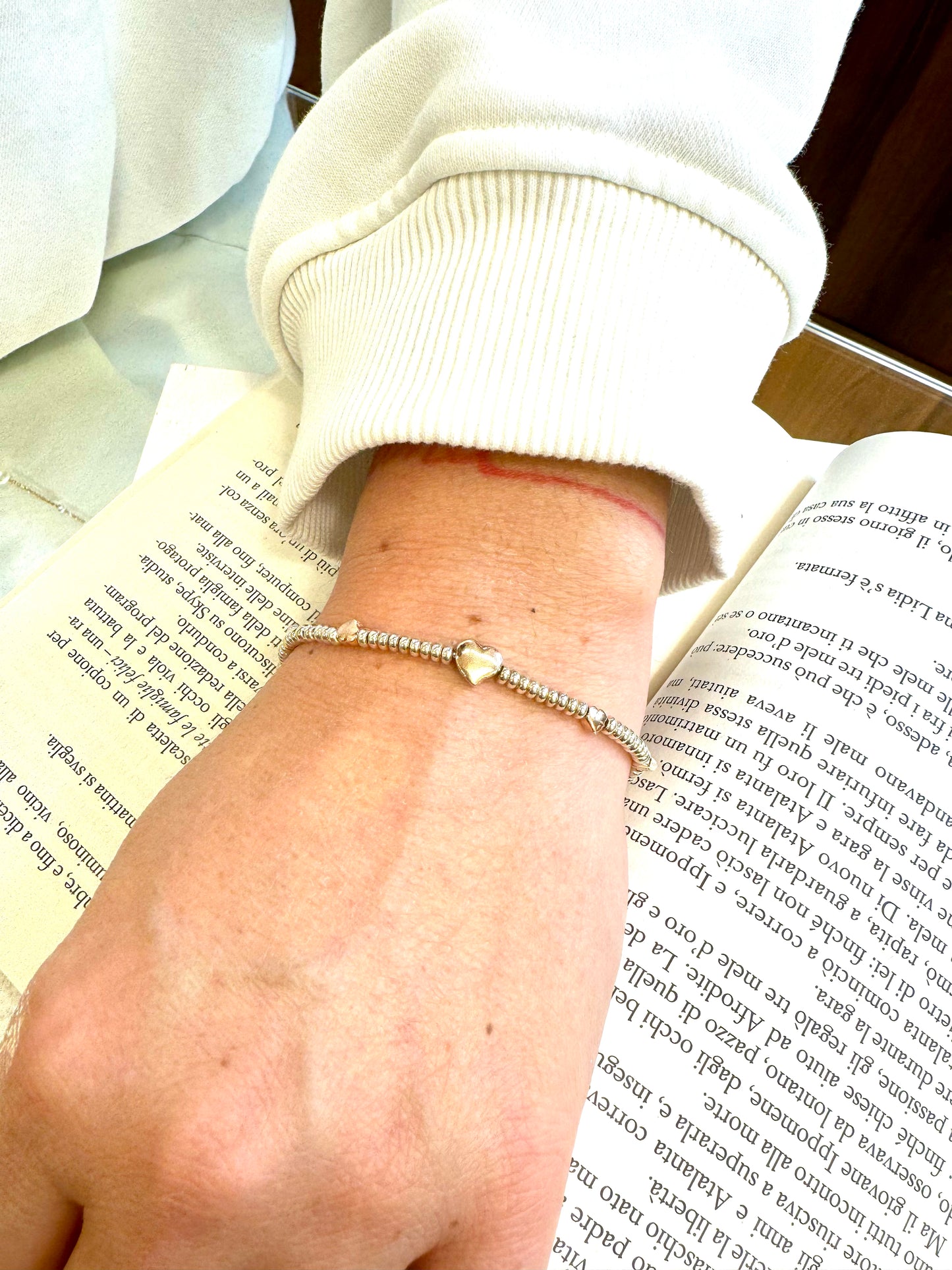 Bracciale in argento 925 con soggetti placcati in oro rosa