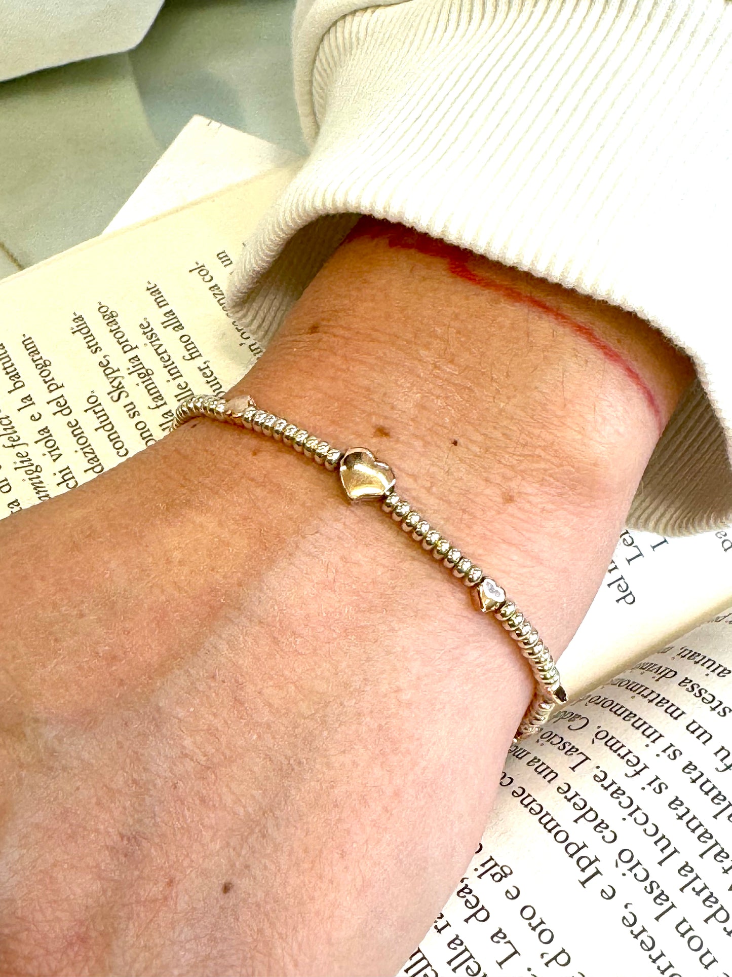 Bracciale in argento 925 con soggetti placcati in oro rosa