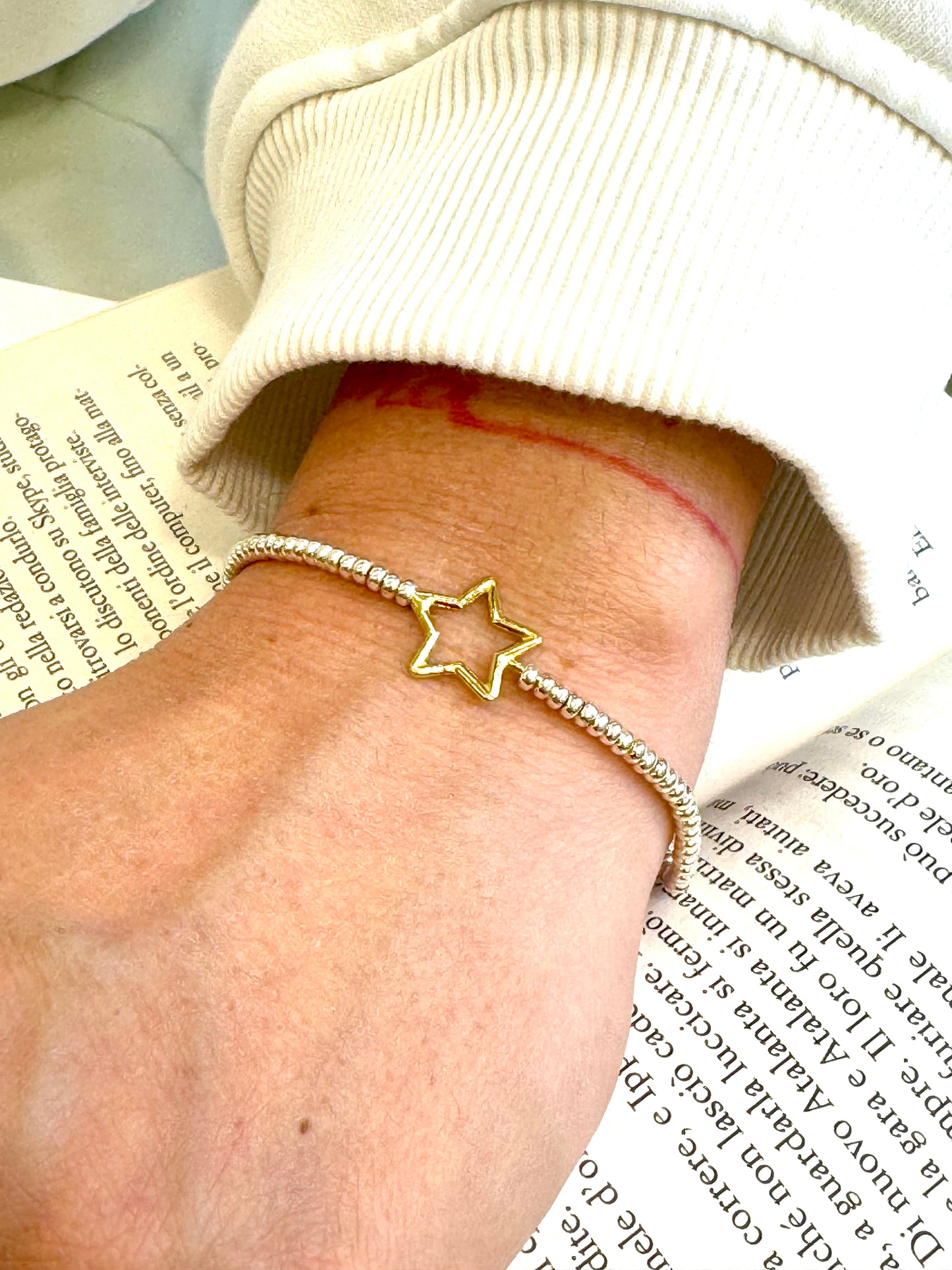 Bracciale in argento 925 con stella placcata in oro giallo