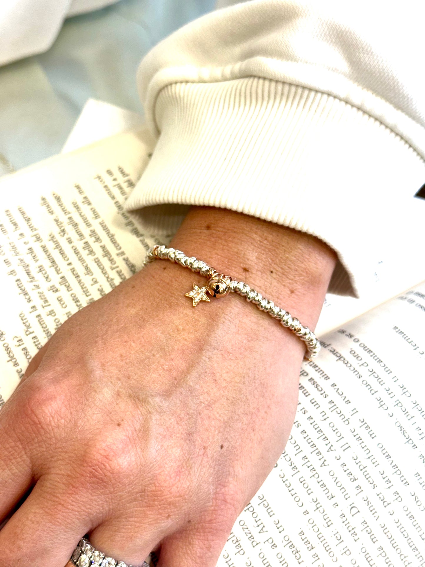 Bracciale in argento 925 con ciondolo stella placcato in oro rosa e pavè di zirconi