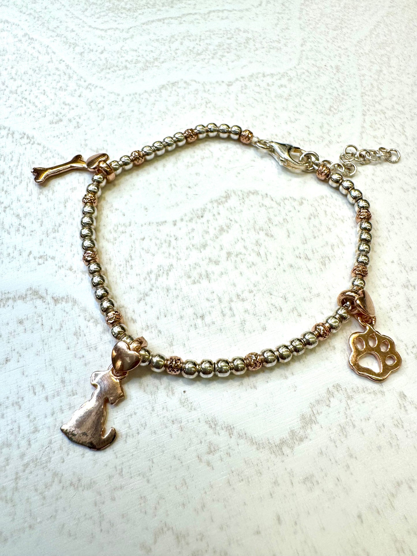 Bracciale in argento 925 con ciondoli placcati in oro rosa