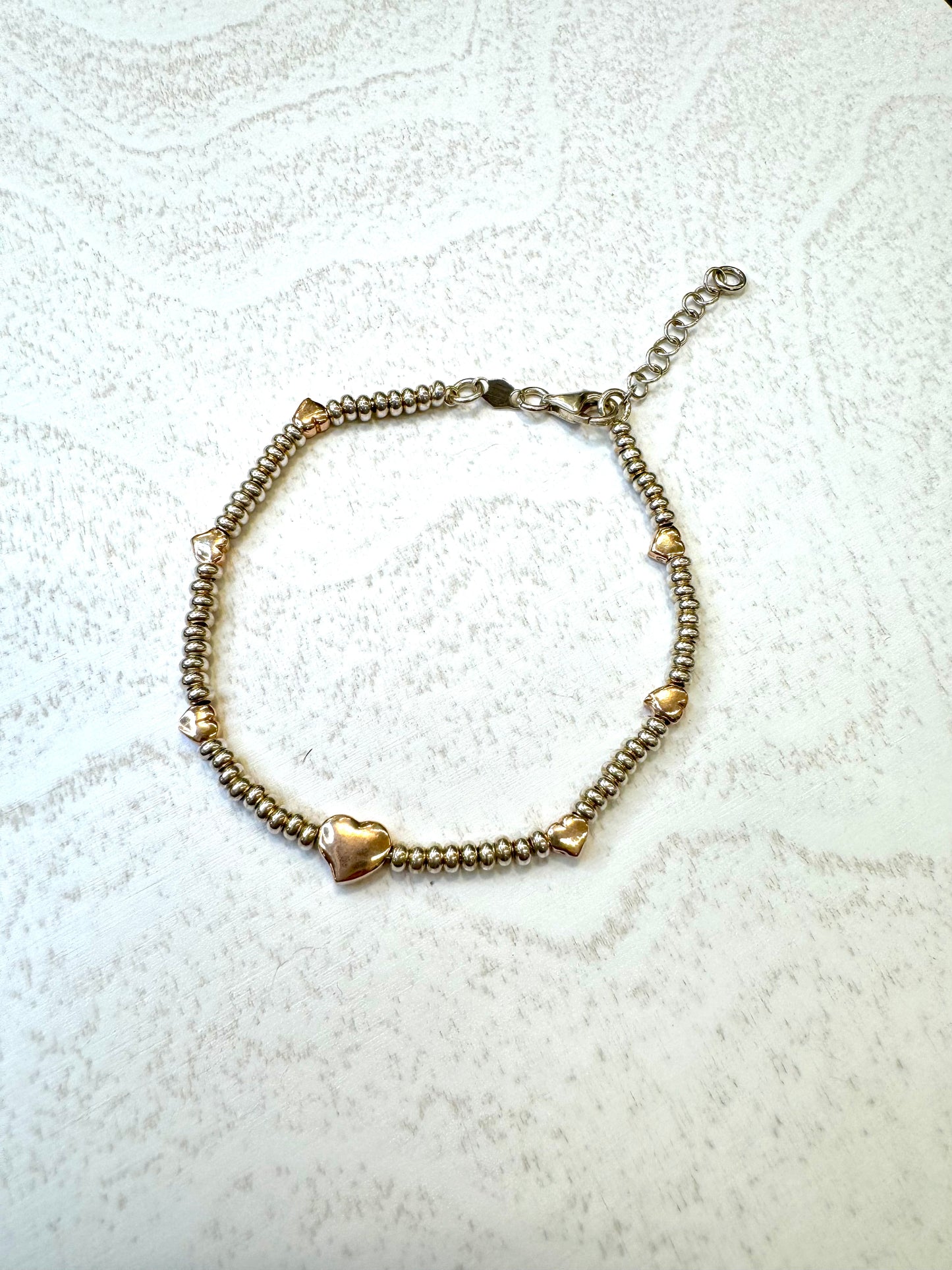 Bracciale in argento 925 con soggetti placcati in oro rosa
