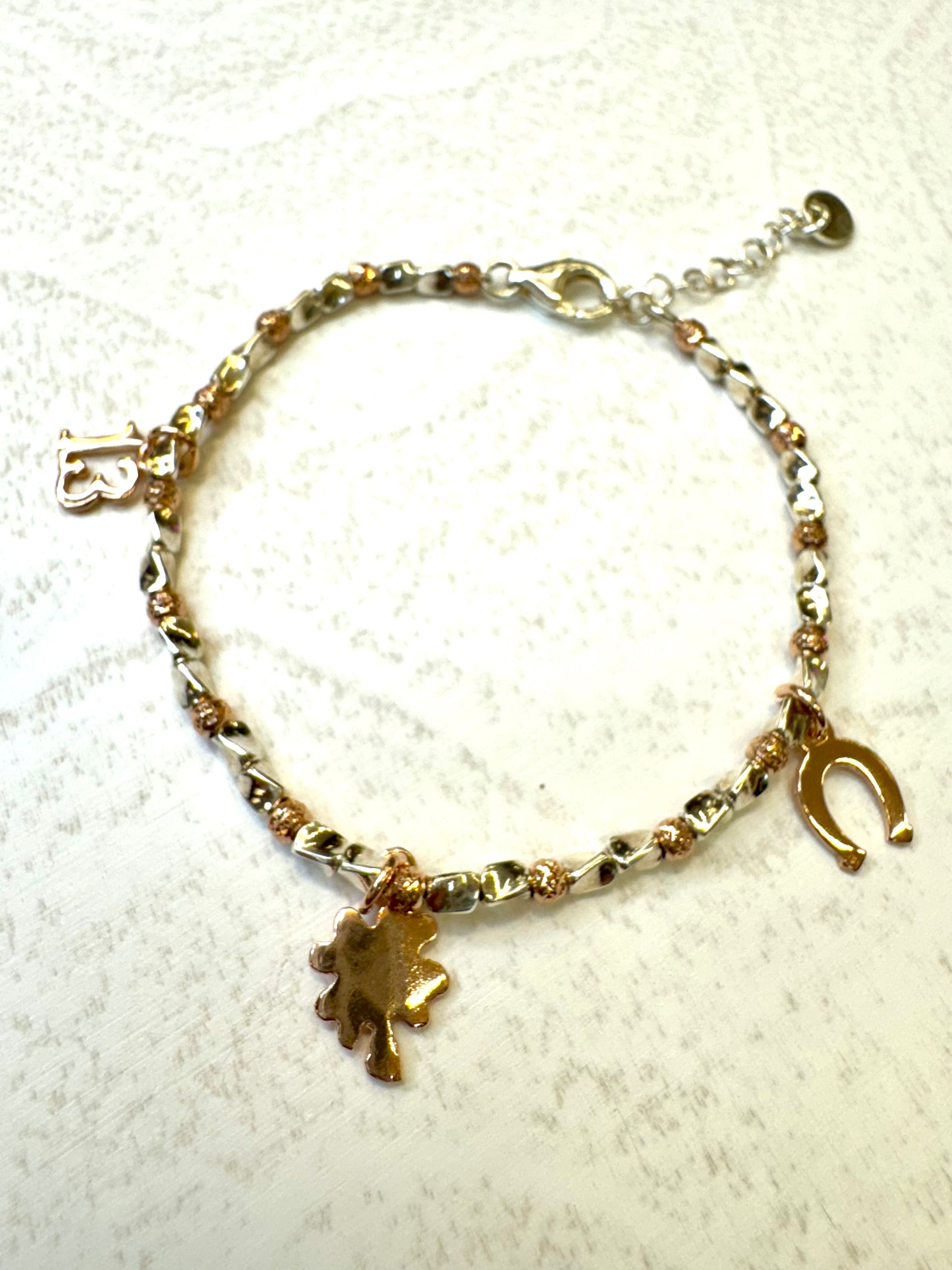 Bracciale in argento 925 con ciondoli placcati in oro rosa