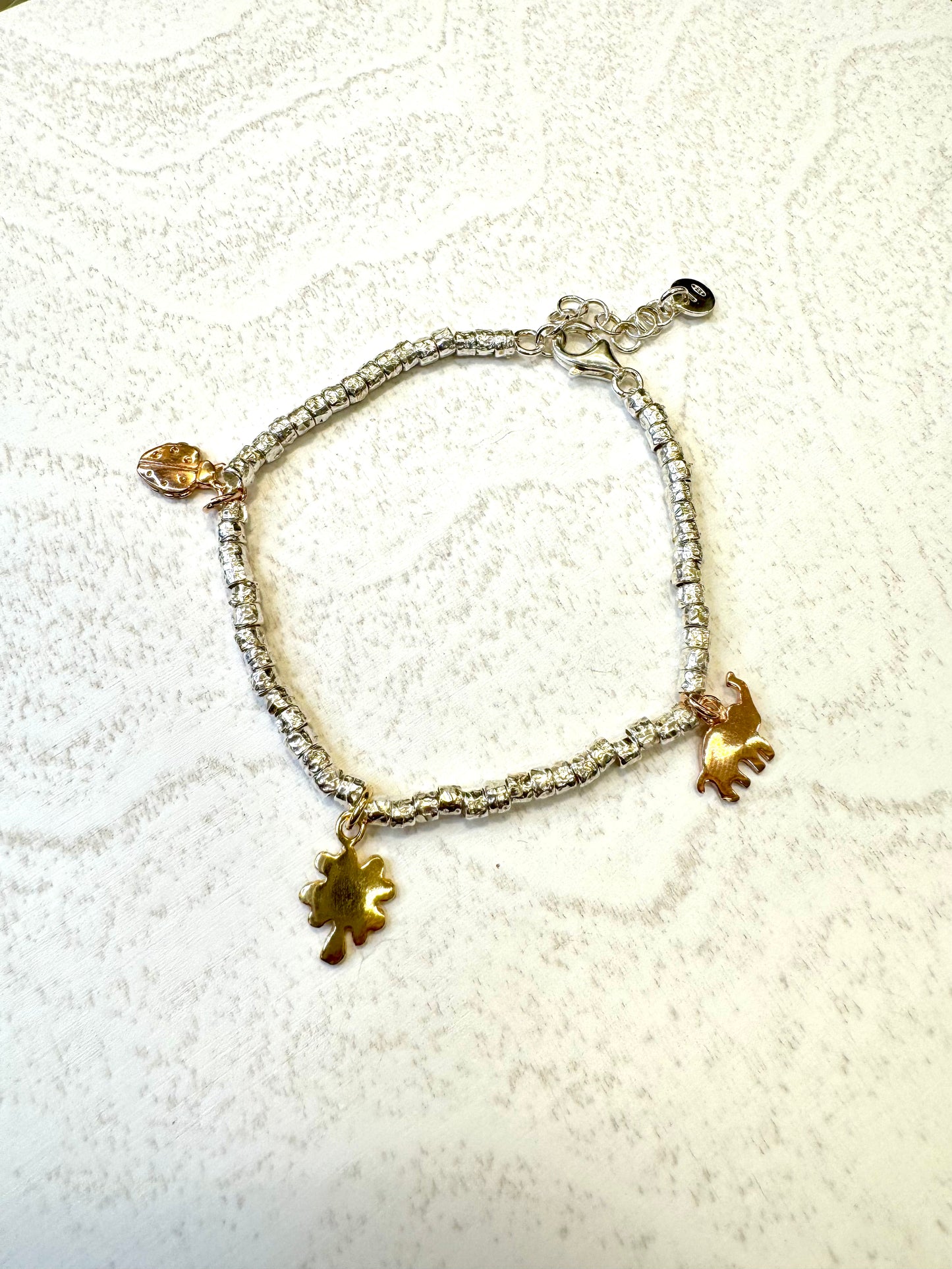Bracciale in argento 925 con ciondolo placcati in oro giallo e rosa