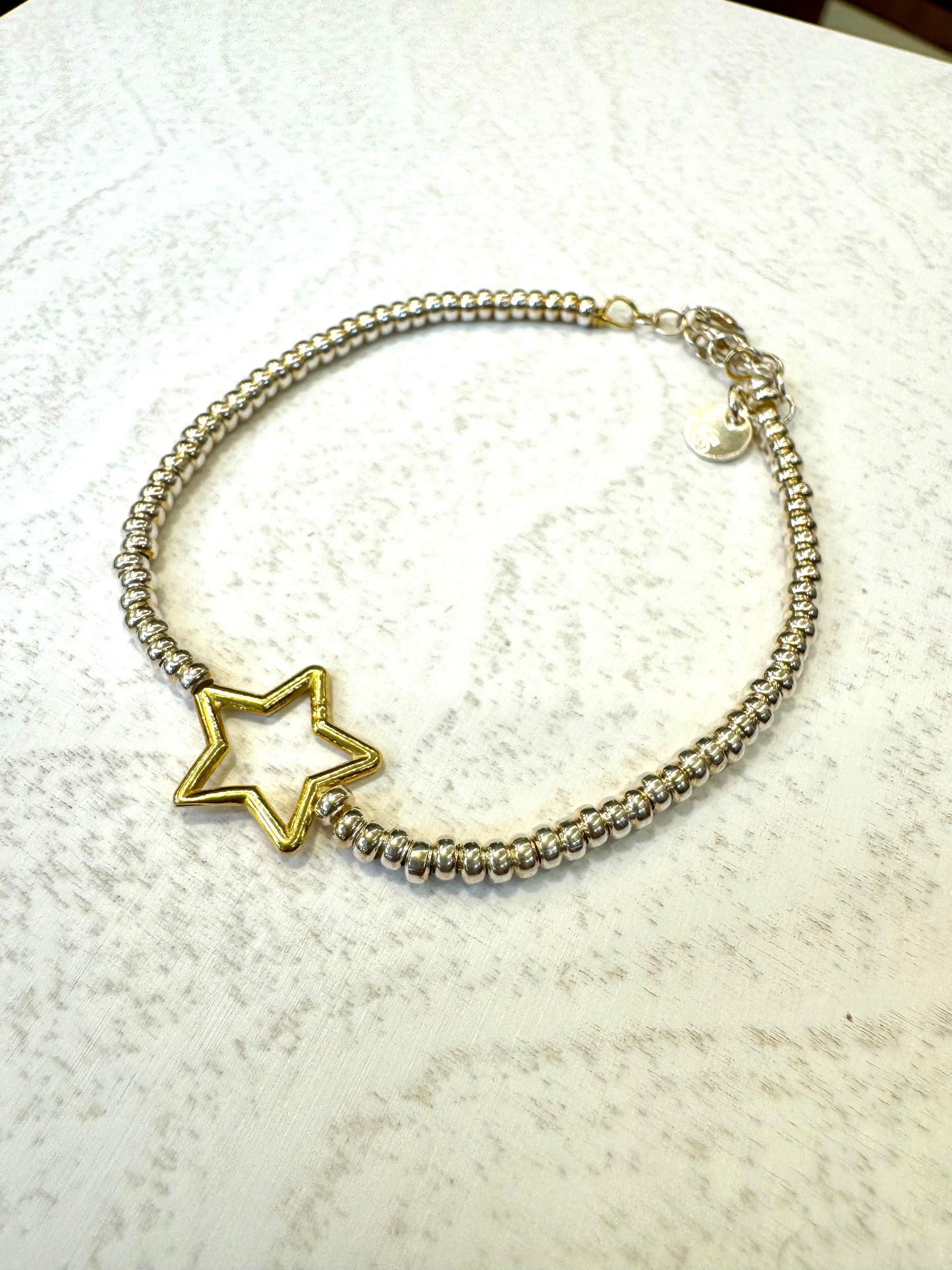 Bracciale in argento 925 con stella placcata in oro giallo