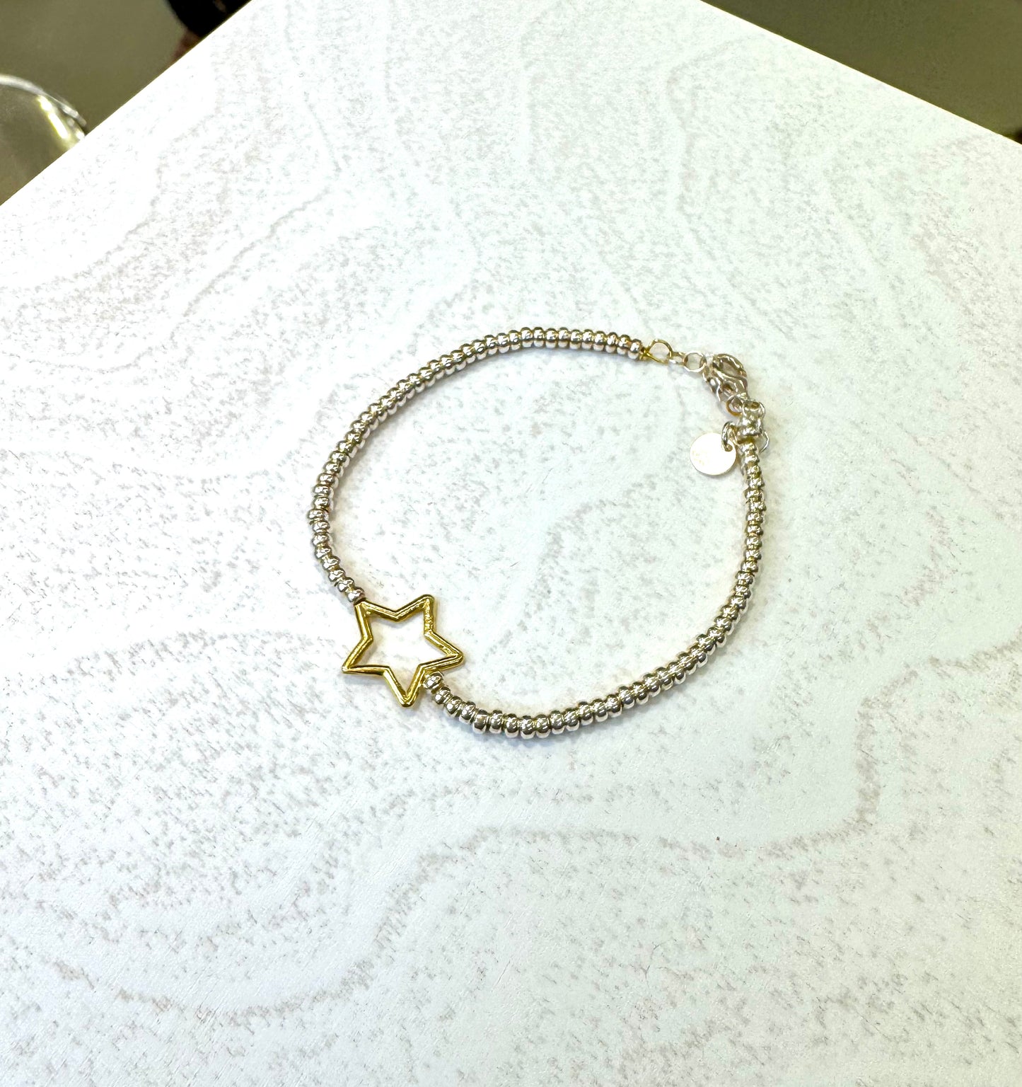 Bracciale in argento 925 con stella placcata in oro giallo